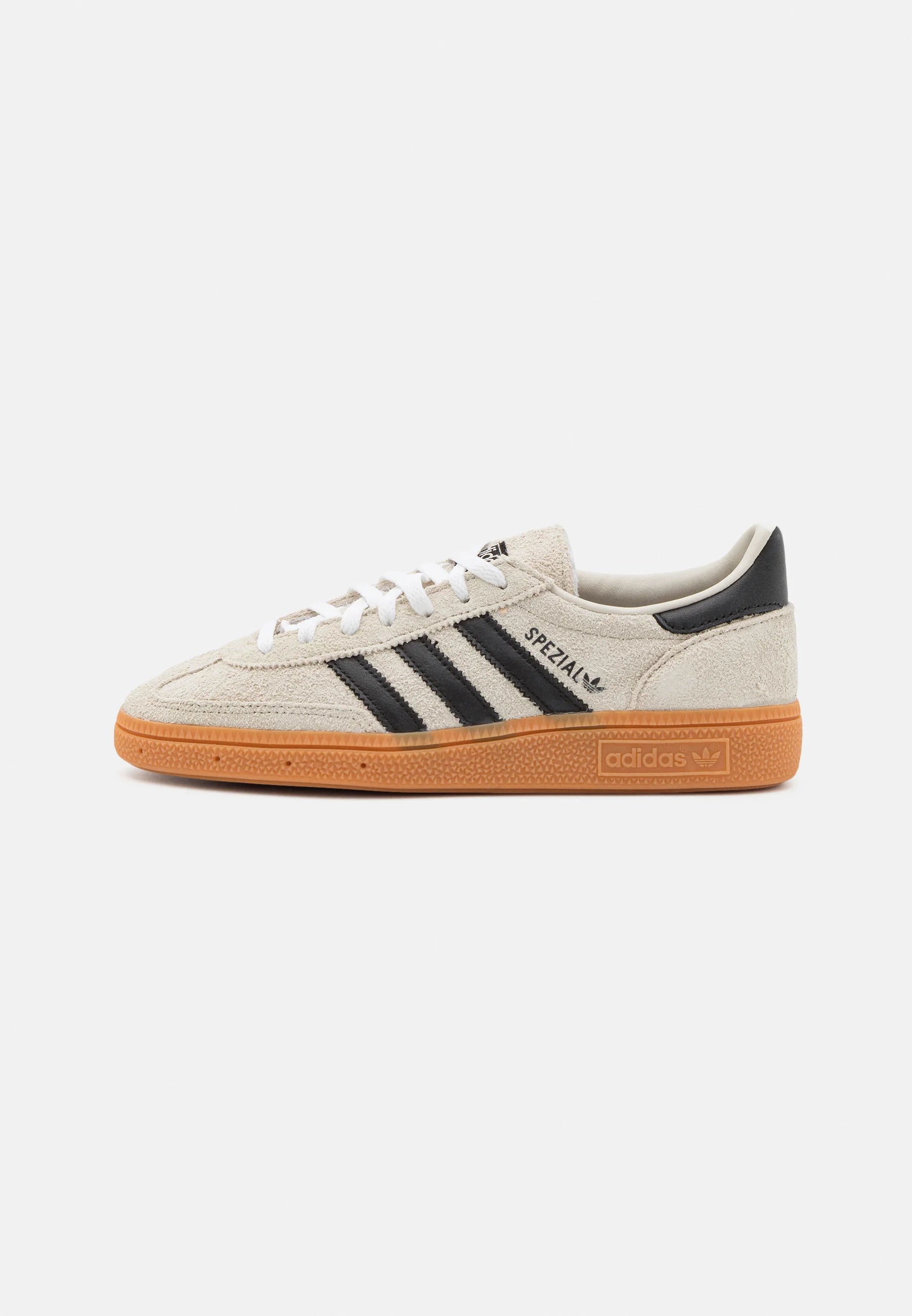 Adidas Handball Spezial Aluminium Core black 
Shop dit næste par Handball Spezial. Disse Handball Spezial, er de perfekte sneaker til enhver lejlighed. Deres elegante design sikre dig en alsidig sneaker. 
Set fra siden