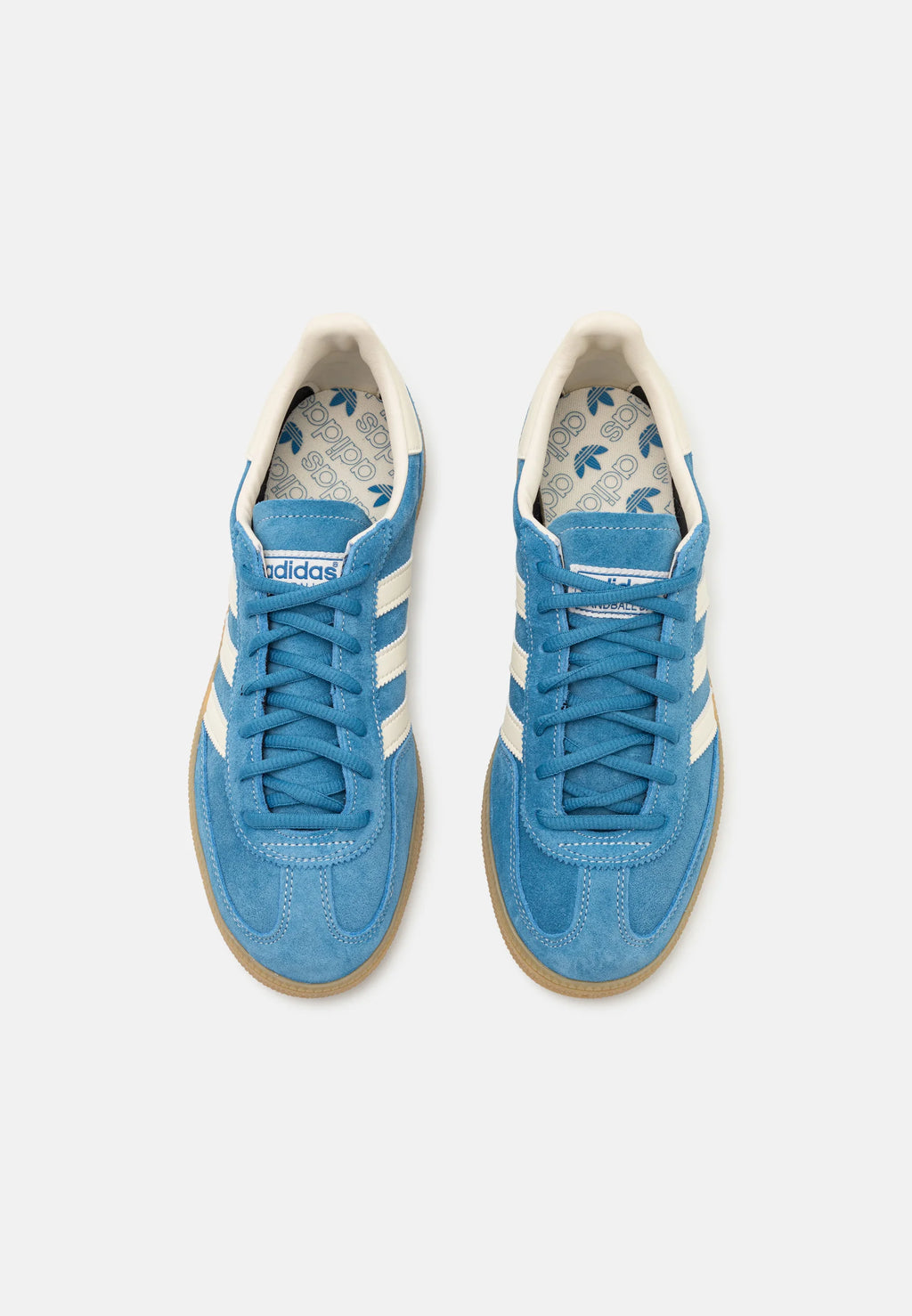 Adidas Handball Spezial Core blue cream white
Shop dit næste par Handball Spezial. Disse Handball Spezial Wonder Silver, er de perfekte sneaker til enhver lejlighed. Deres elegante design sikre dig en alsidig sneaker. 
Set fra toppen