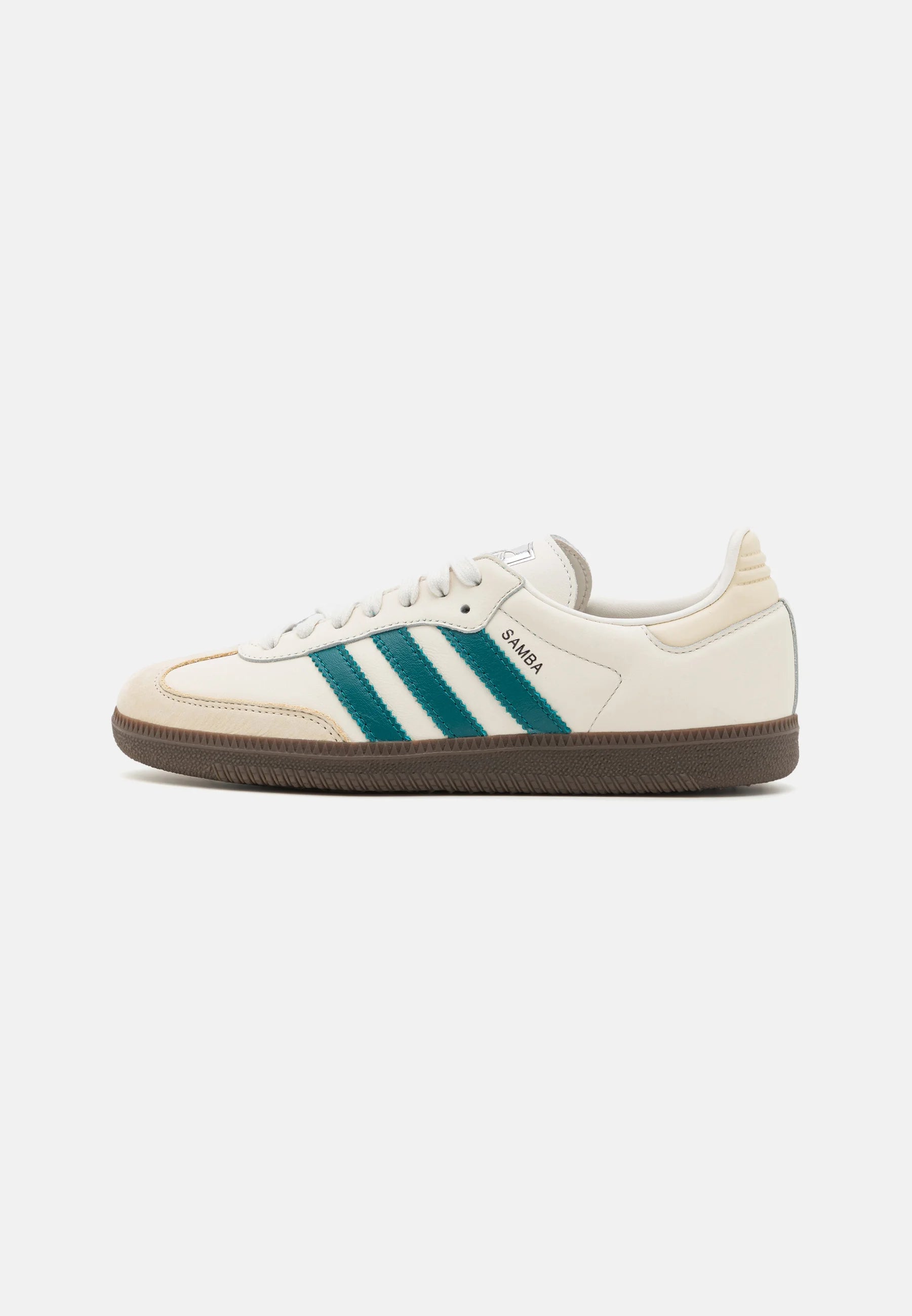 Adidas Samba OG Cloud White Legacy Teal
Shop dit næste par Adidas Samba her hos os. Samba er den perfekte kvalitets sko, med sin yderst gode komfort er det den perfekte sneaker til alle. Køb dem lige her
Set fra siden