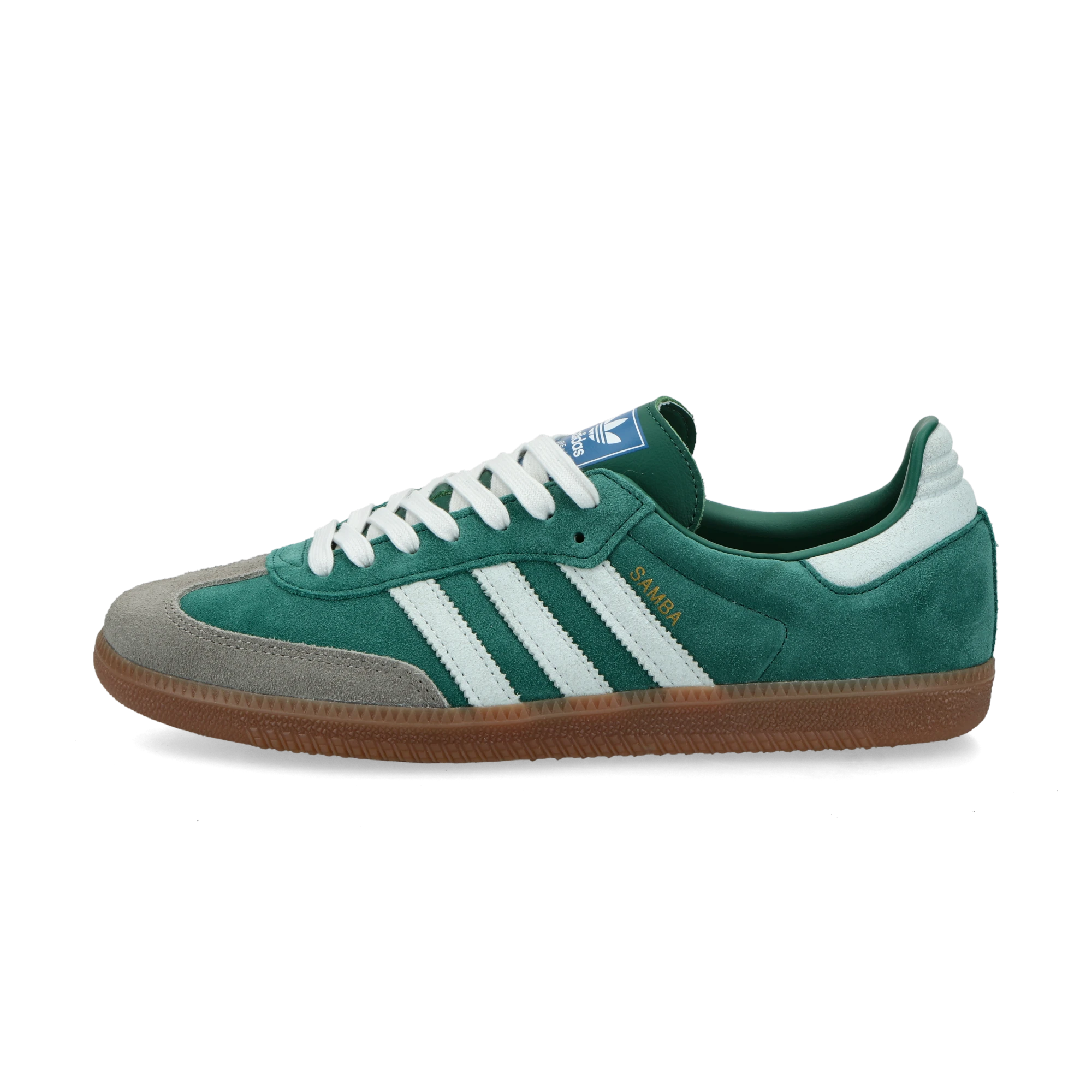 Adidas Samba OG Collegiate Green Gum Grey Toe.
Denne sneaker er perfekt til at skille sig ud på gaden. Den kommer i en smuk grøn farve og skiller sig bestemt ud fra mængden. Køb denne lækre sneaker her hos os.
set fra siden
